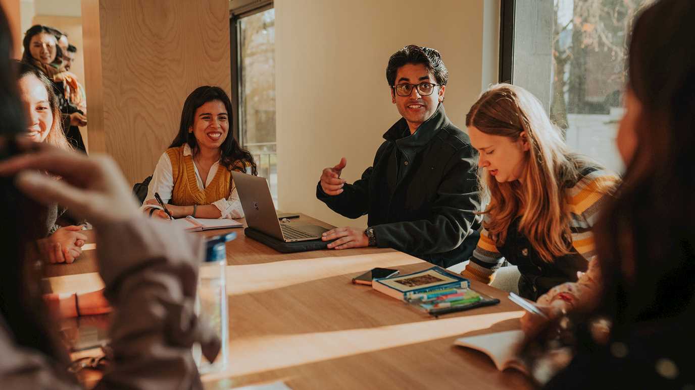 Students interacting in Royal Holloway's London Campus 