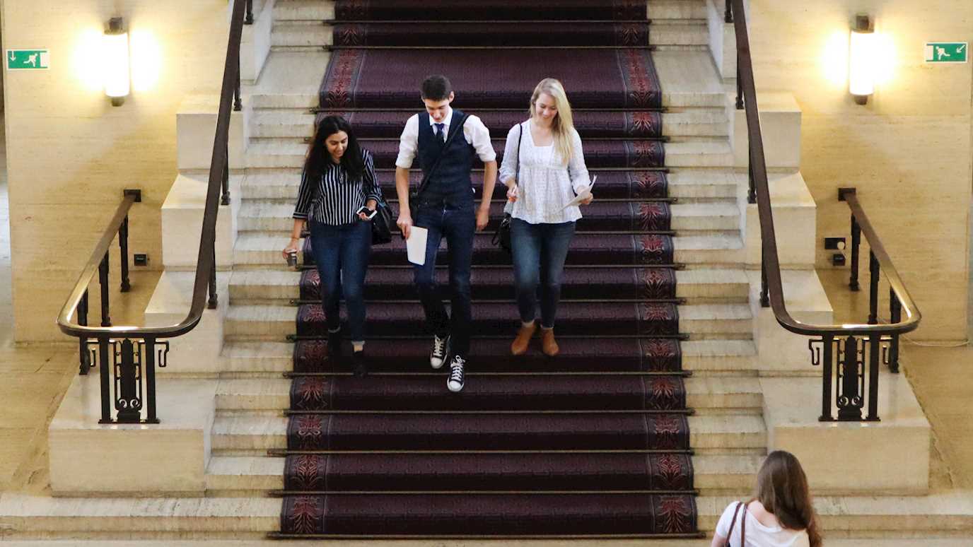Students on staircase in Senate House: 