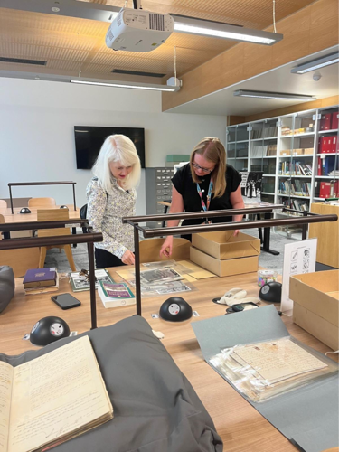 A person and a child working on a table

AI-generated content may be incorrect.