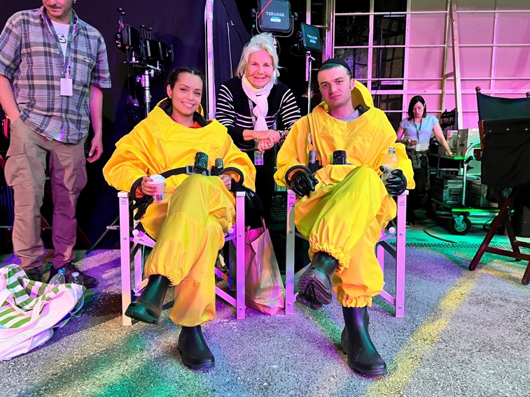 Georgina Campbell at the film set sitting in director chairs with her co-star