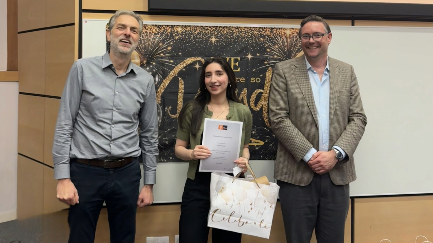 Sarah receiving the Final Year 'Empowerment Award' from Royal Holloway Business School 
