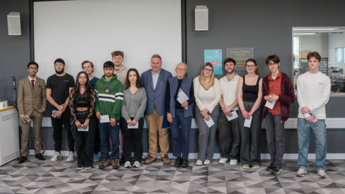Group photo of second year top 3 student teams and judging panel