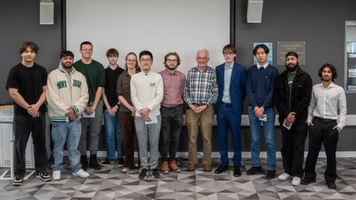 Top 3 student teams and judging panel group photo