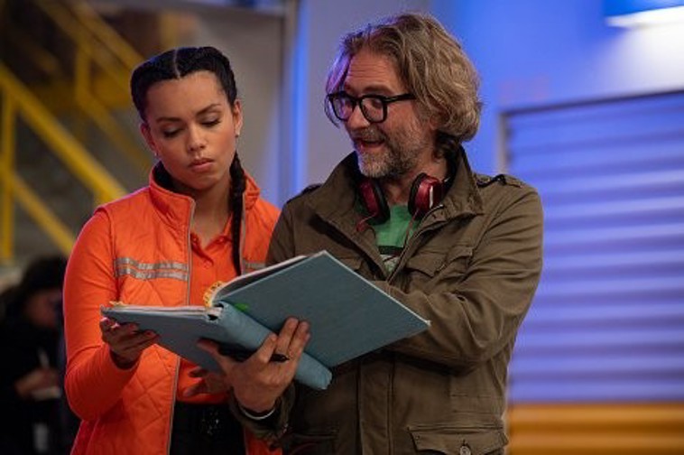 Georgina Campbell on a film set with a director